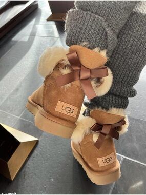 UGG Kids Mini Bailey Bow II boots in chestnut.